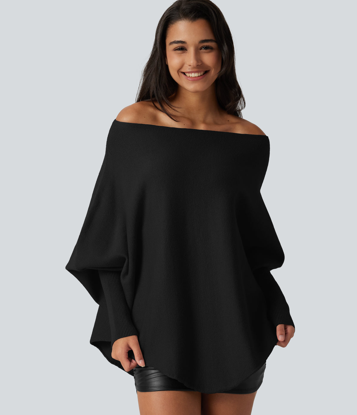 Jersey oversize con mangas murciélago y bajo asimétrico - Negro