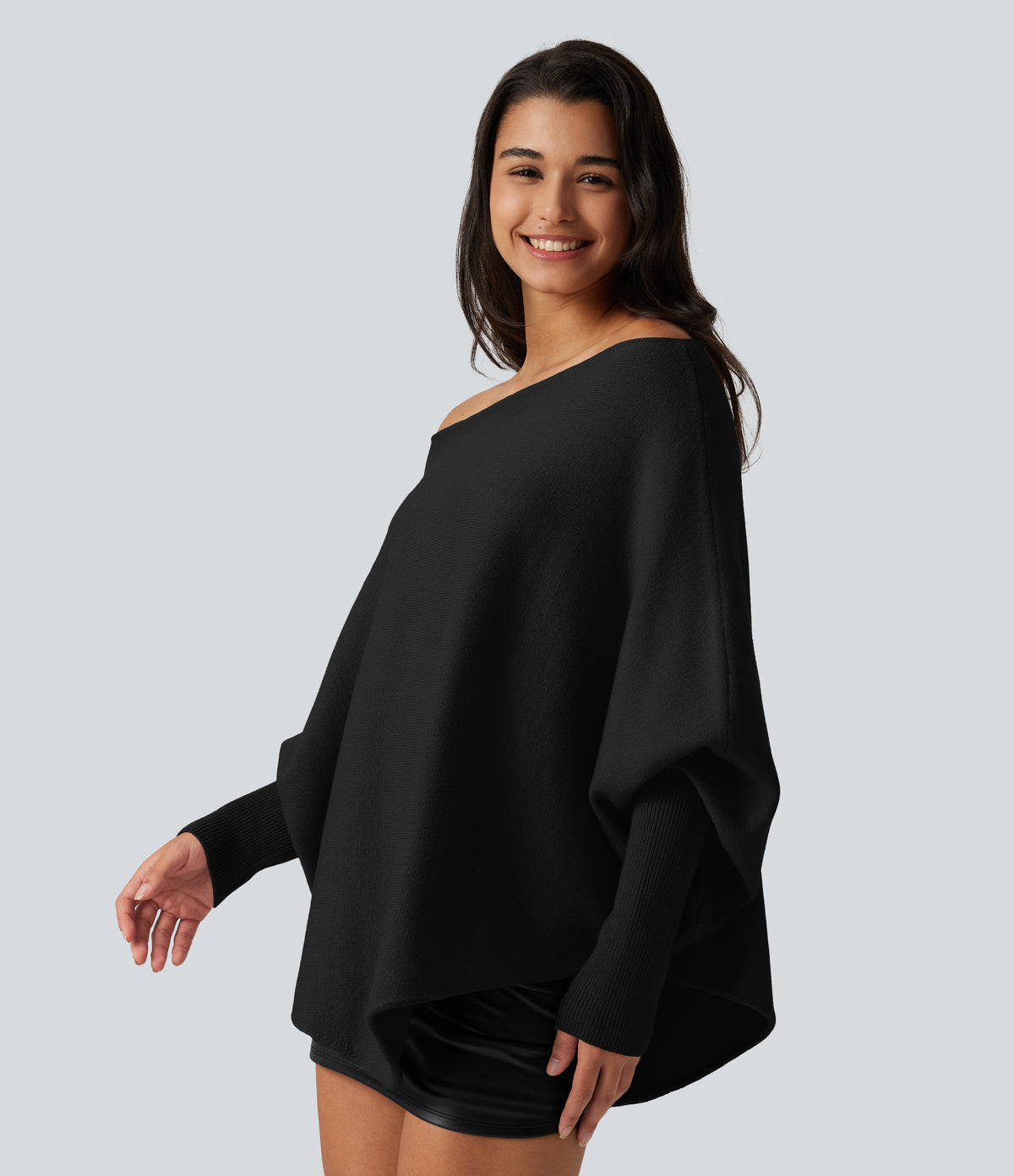 Jersey oversize con mangas murciélago y bajo asimétrico - Negro