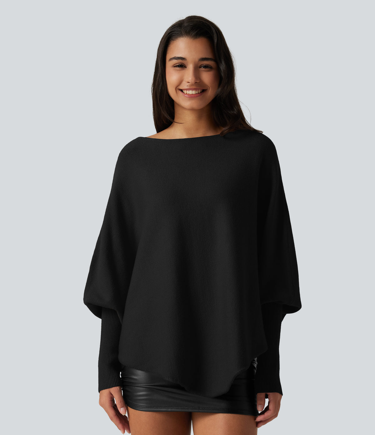 Jersey oversize con mangas murciélago y bajo asimétrico - Negro