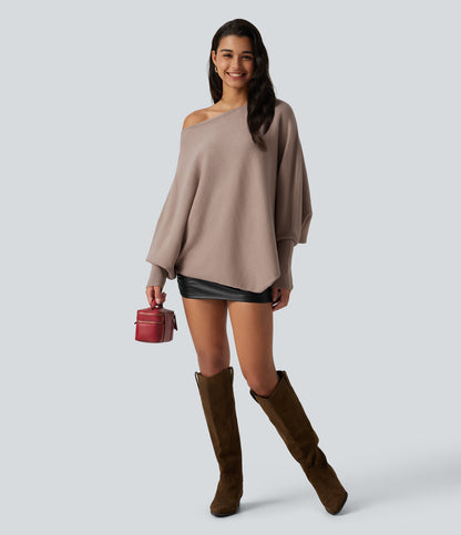 Jersey oversize con mangas murciélago y bajo asimétrico - Topo